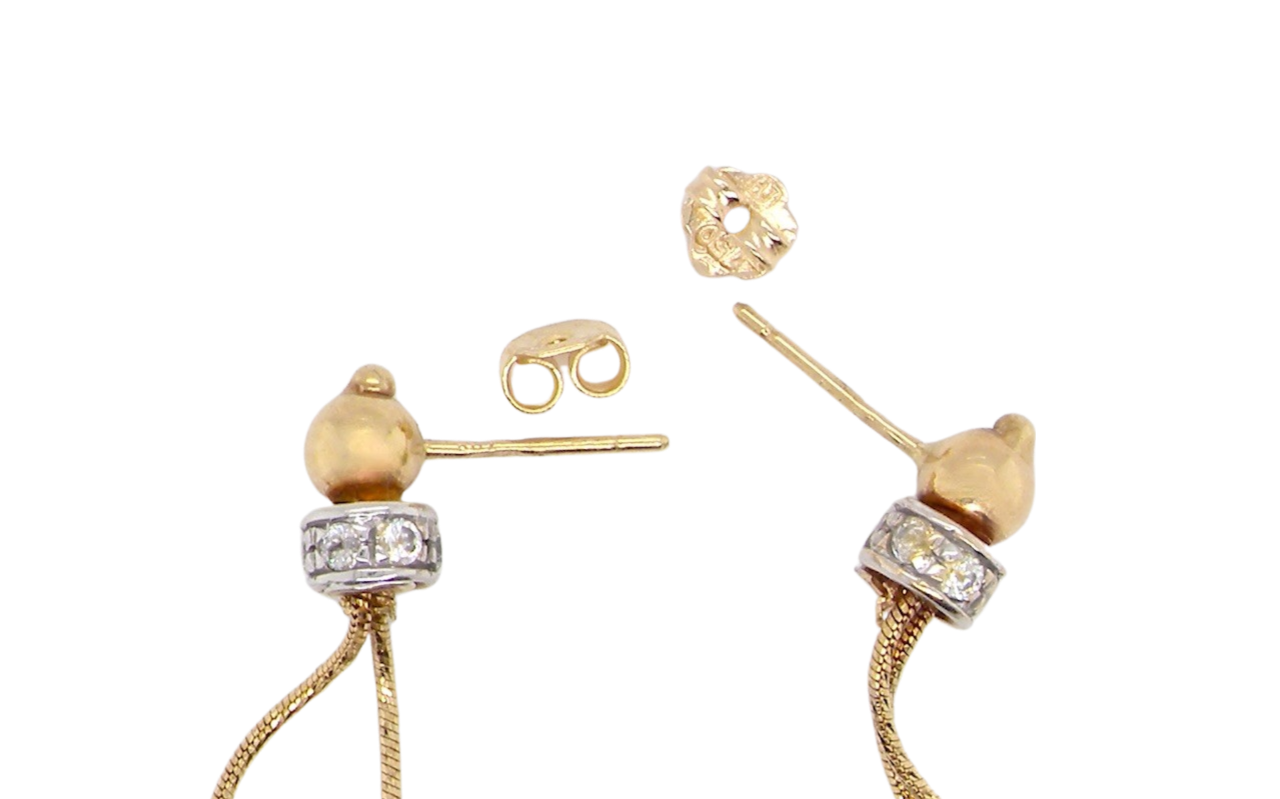 A pair of sapphire drop earrings