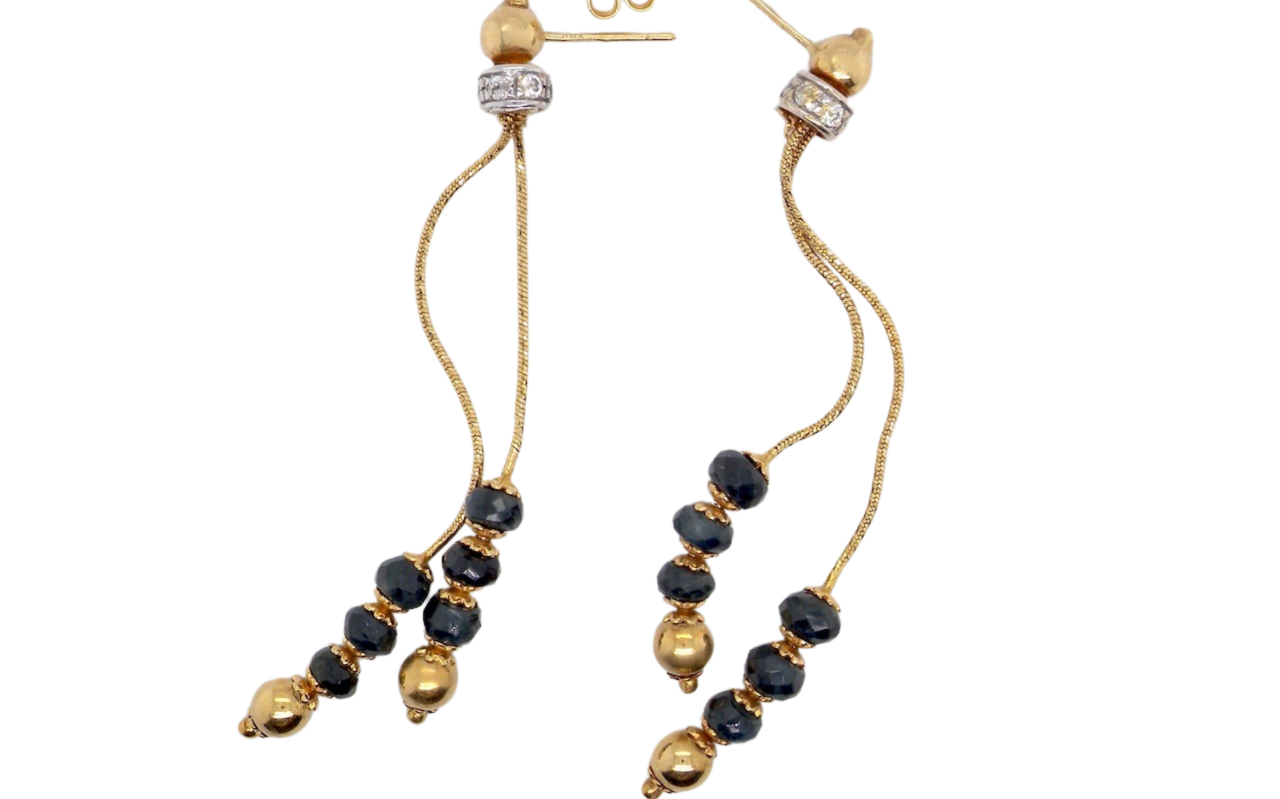 A pair of sapphire drop earrings