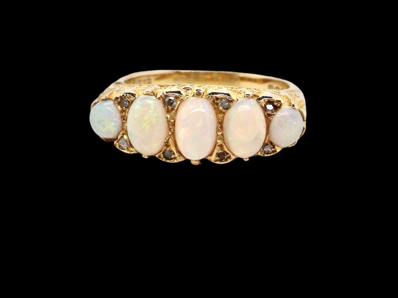 18 carat gold five stone opal ring
