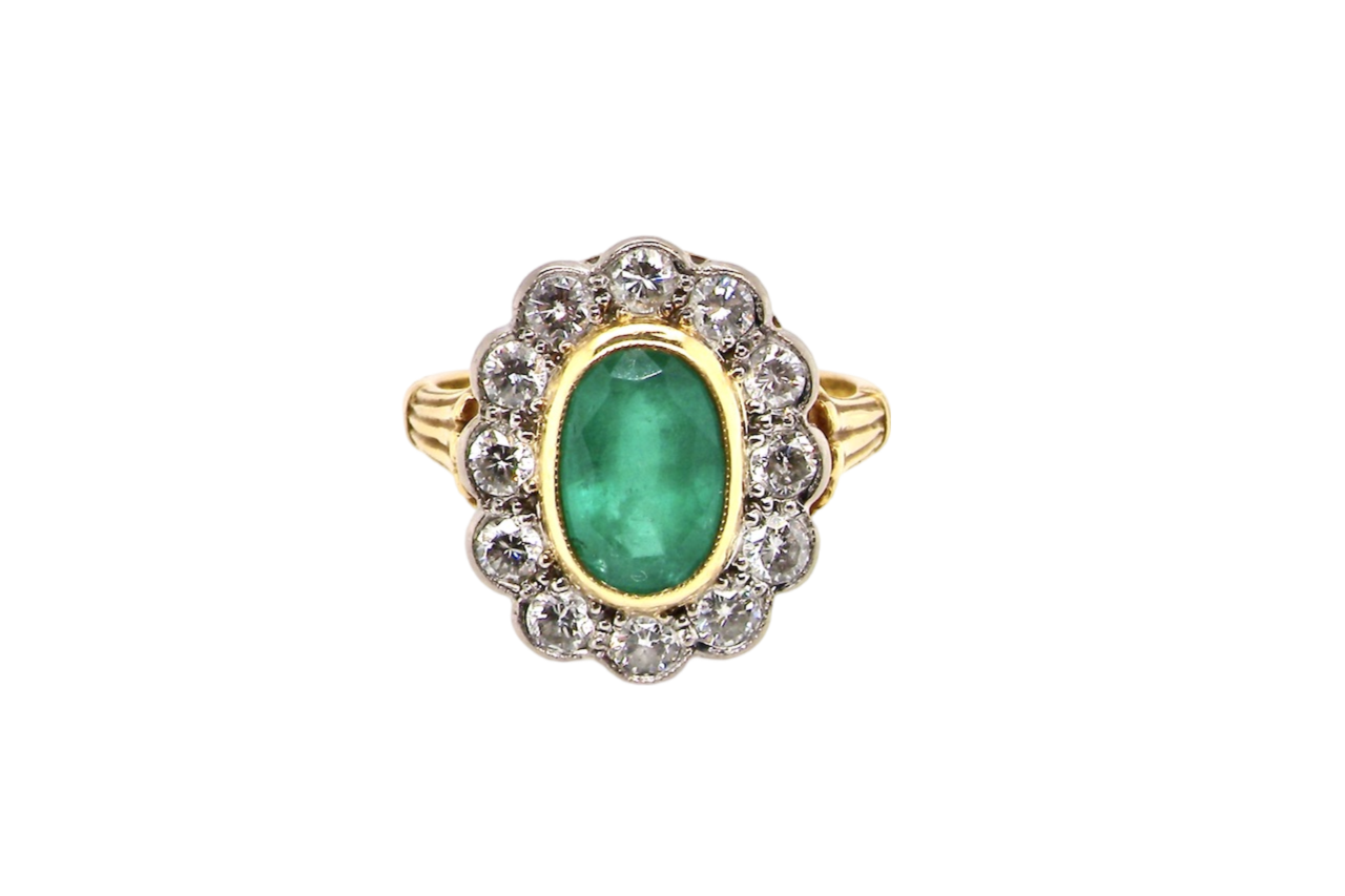 An impressive Emerald and Diamond Ring