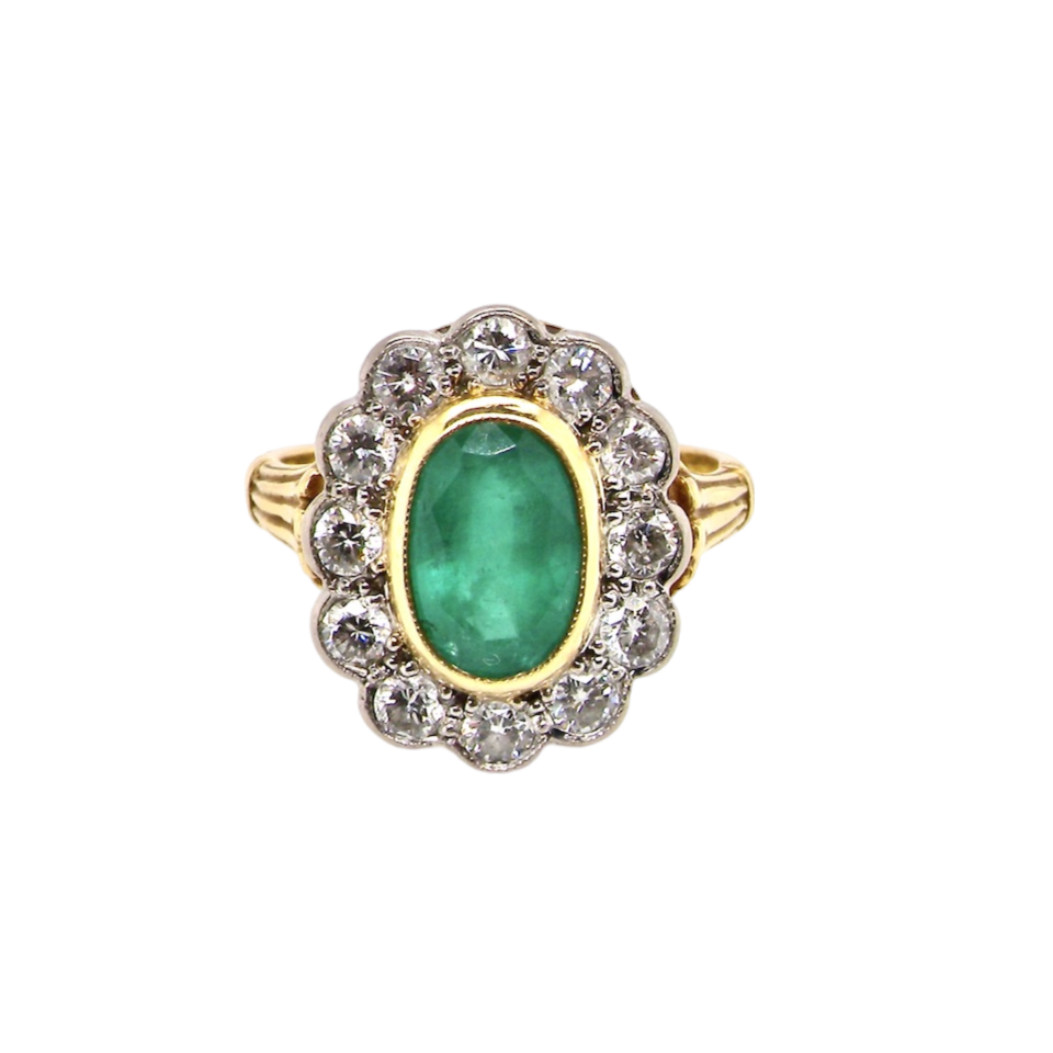 An impressive Emerald and Diamond Ring
