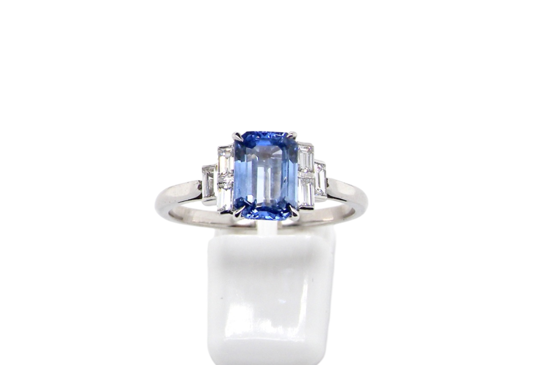 A platinum sapphire and diamond ring