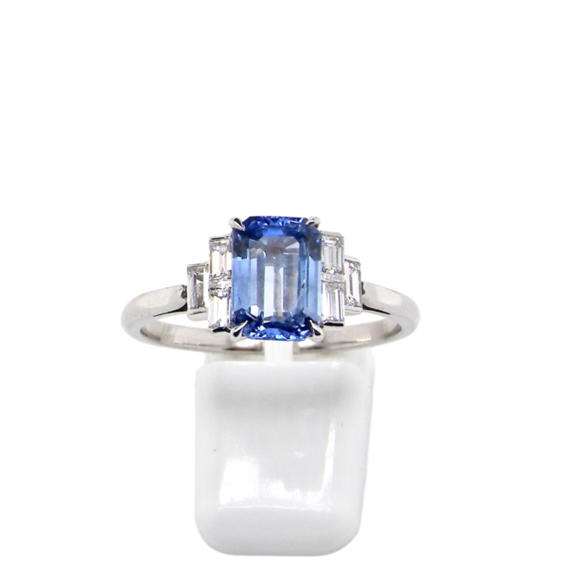 A platinum sapphire and diamond ring