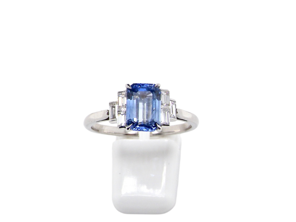 A platinum sapphire and diamond ring