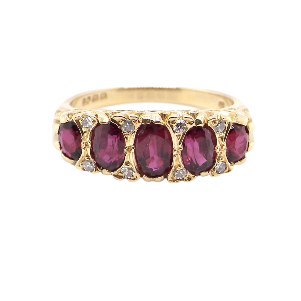 A fine five stone Ruby and Diamond ring