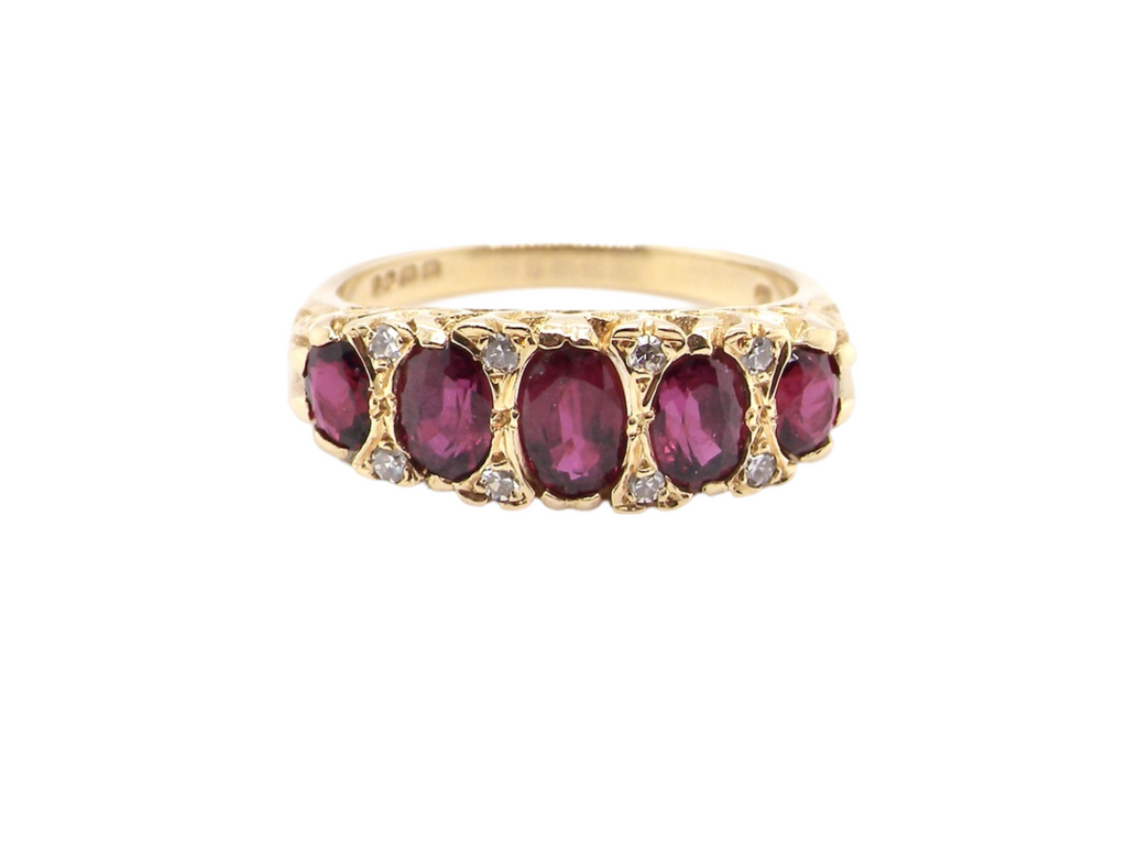 A fine five stone Ruby and Diamond ring