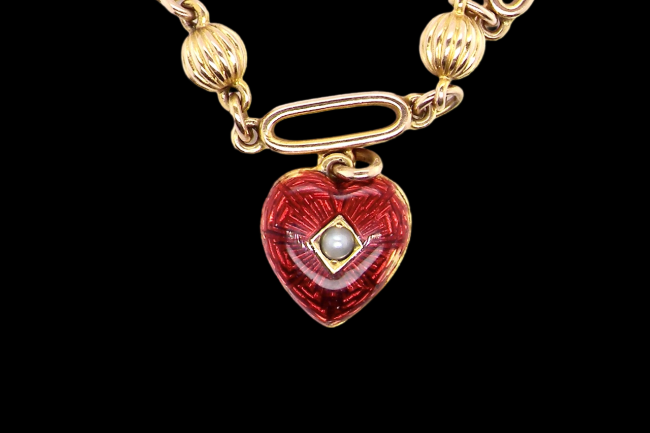 A Victorian bracelet with heart charm