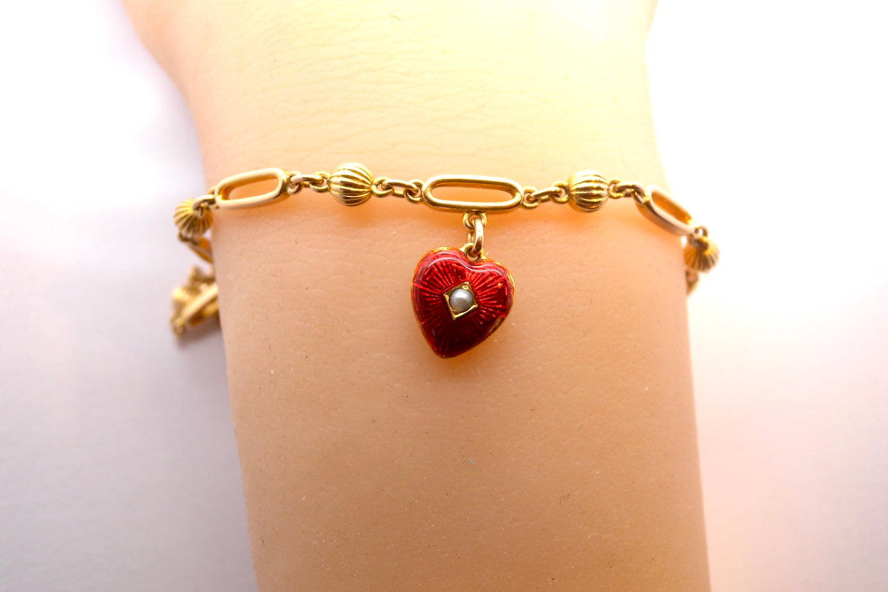 A Victorian bracelet with heart charm