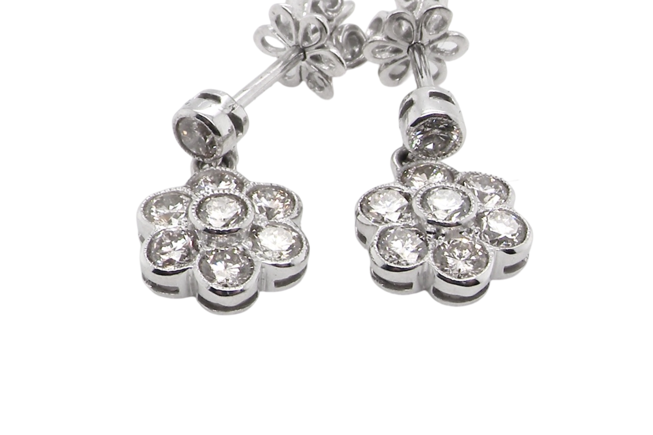 A pair of diamond cluster earrings