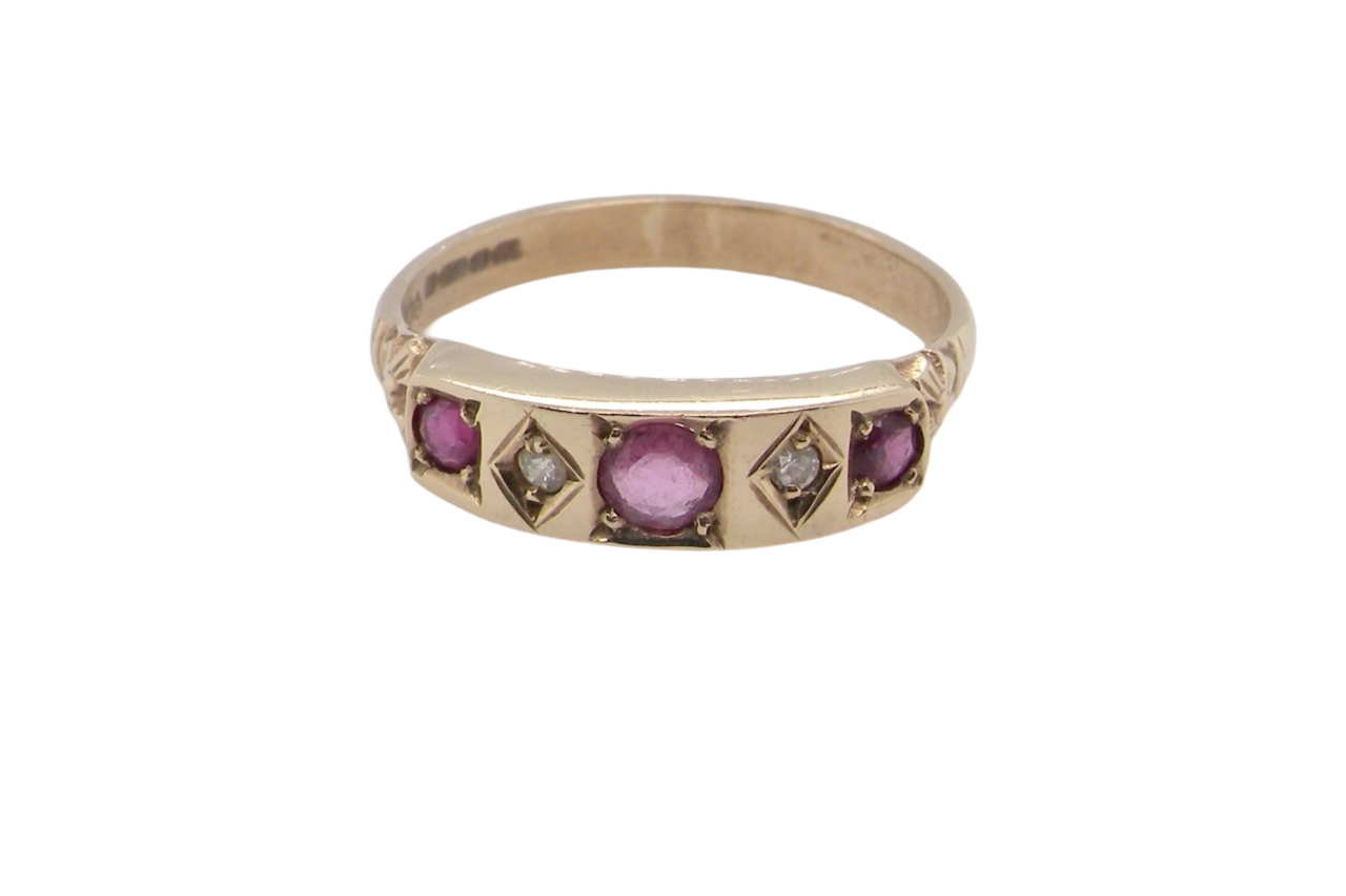 A Victorian style ruby and diamond ring