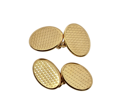A pair of antique gold cufflinks