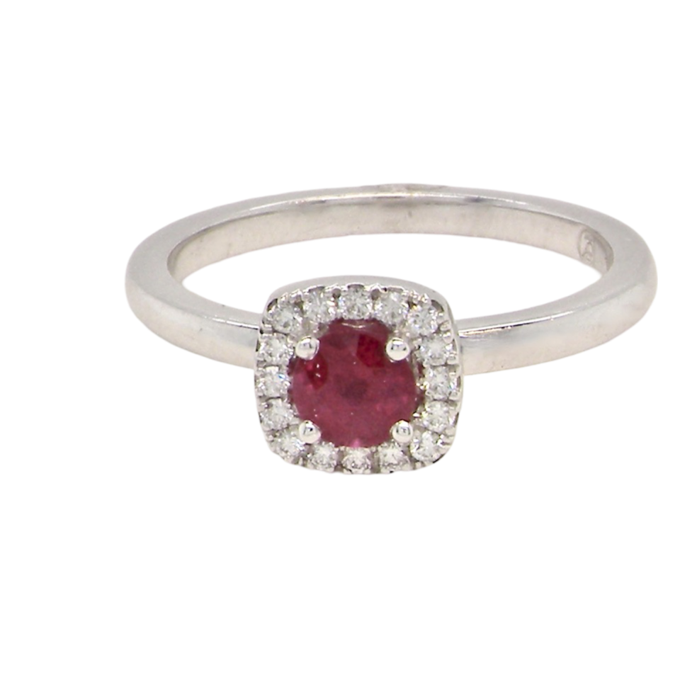 A cushion shaped ruby an d diamond ring