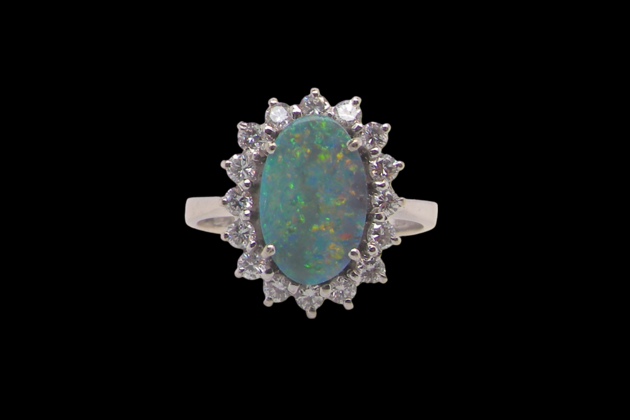 An opal and diamond ring