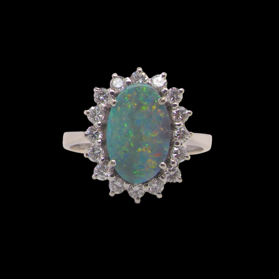 An opal and diamond ring
