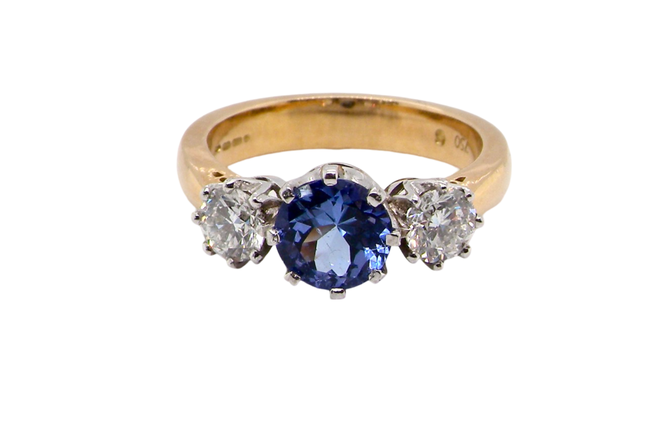 3 stone Tanzanite and Diamond Ring