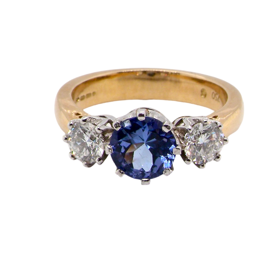 3 stone Tanzanite and Diamond Ring