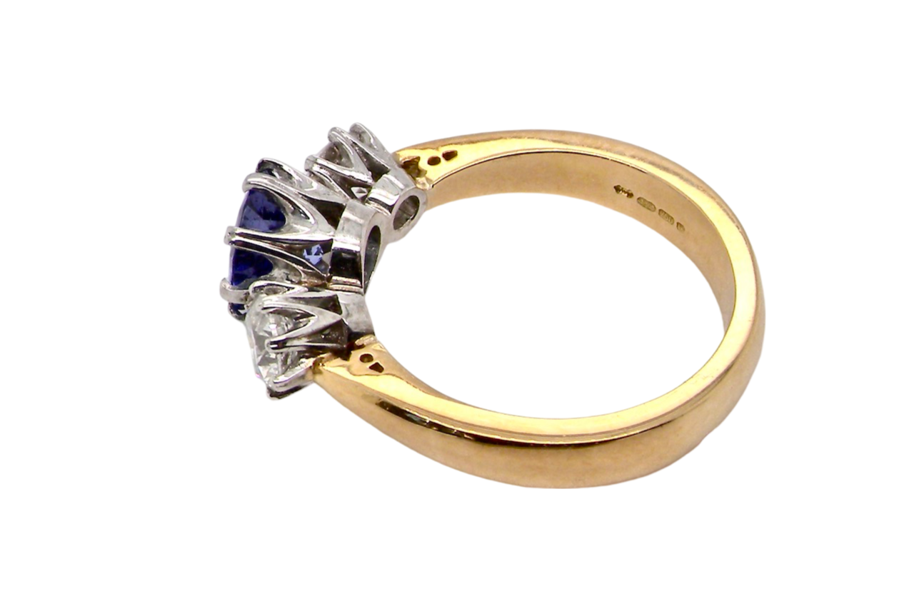 A three stone Tanzanite and Diamond Ring side view