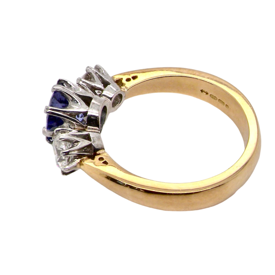 A three stone Tanzanite and Diamond Ring side view