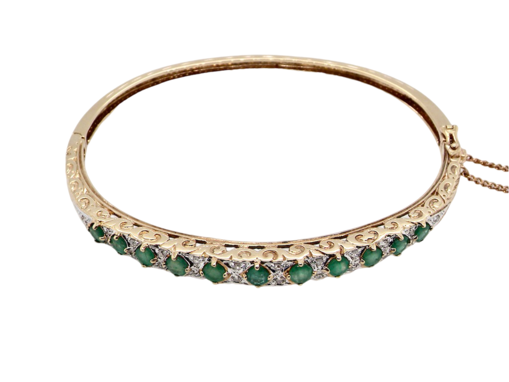 Gold emerald and diamond bangle
