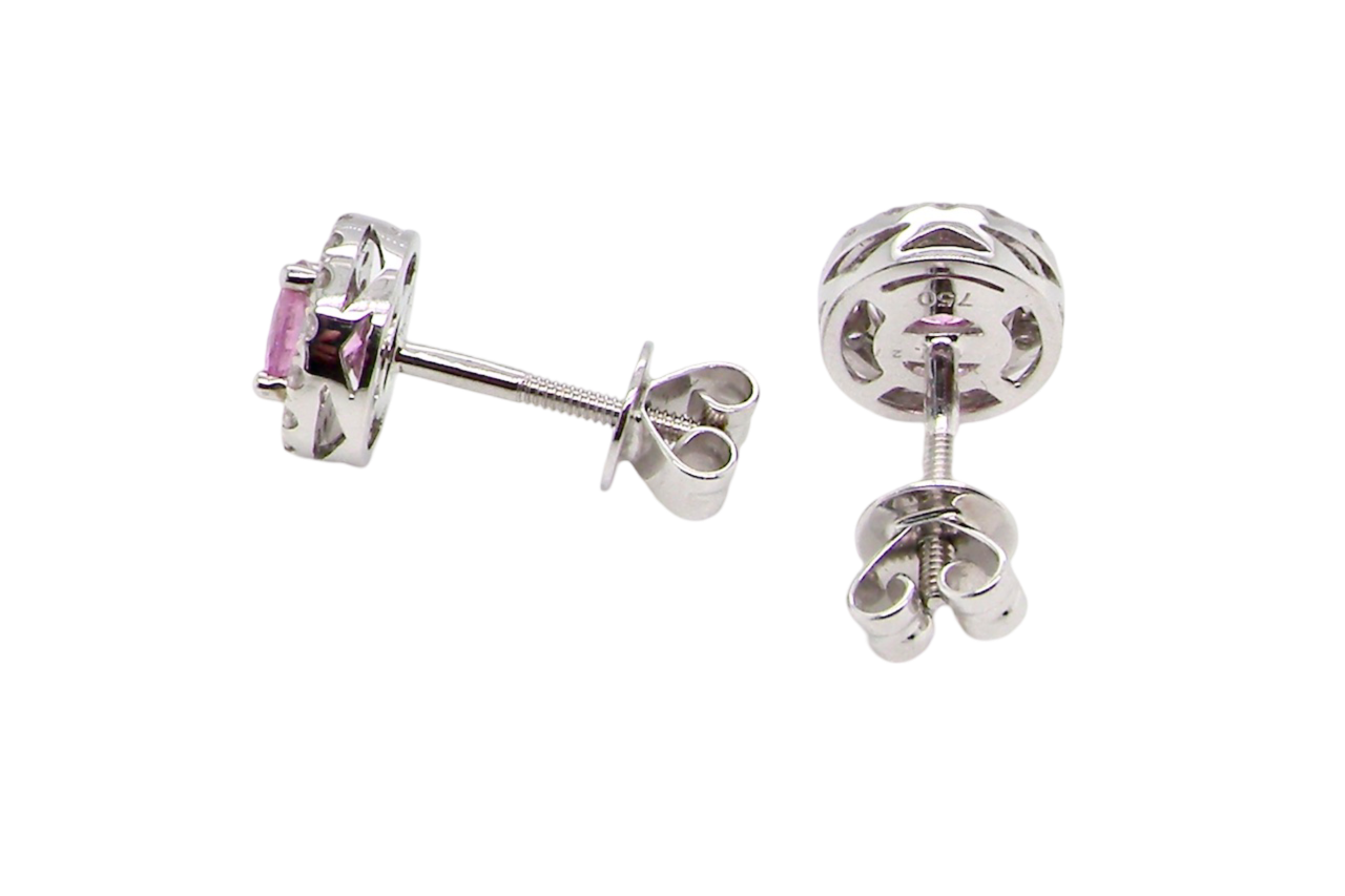 A pair of pink sapphire and diamond earrings rear view
