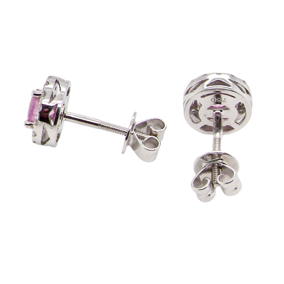A pair of pink sapphire and diamond earrings rear view