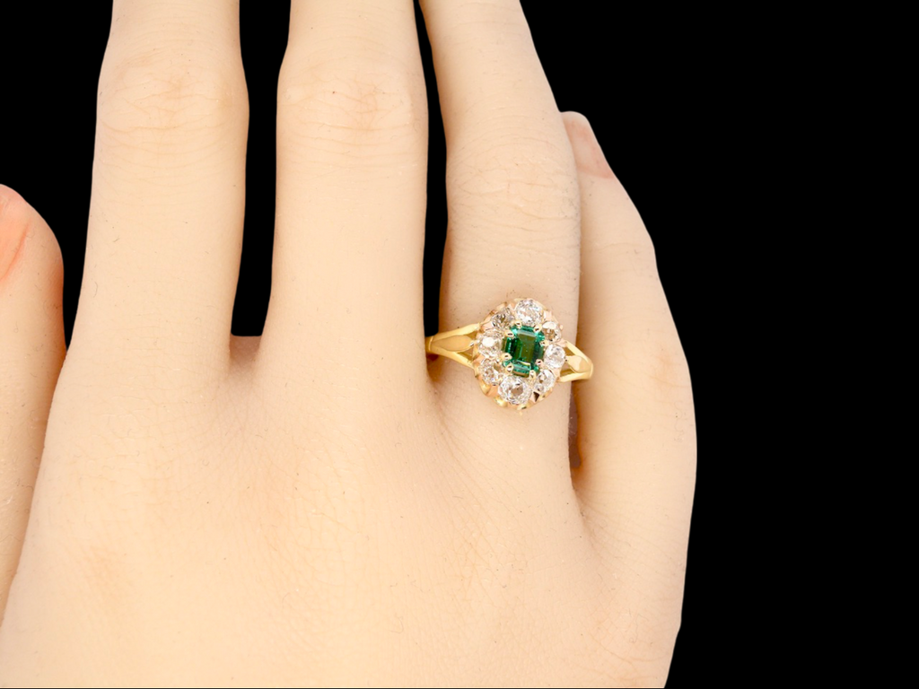 An Emerald and Diamond  Ring