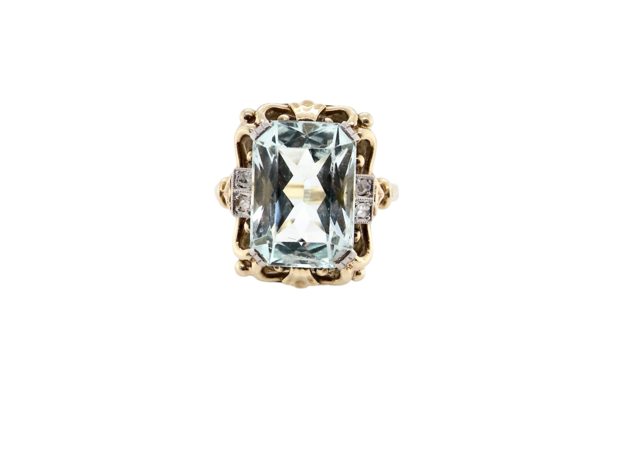 An aquamarine and diamond  ring