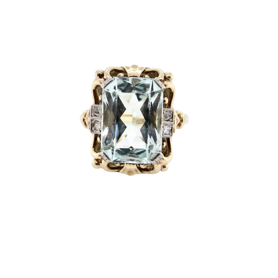 An aquamarine and diamond ring