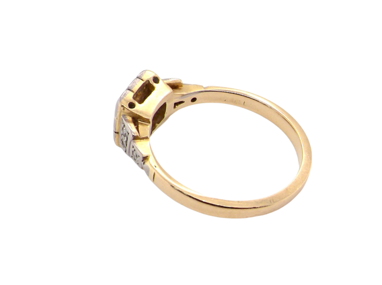 A vintage diamond cluster ring side view