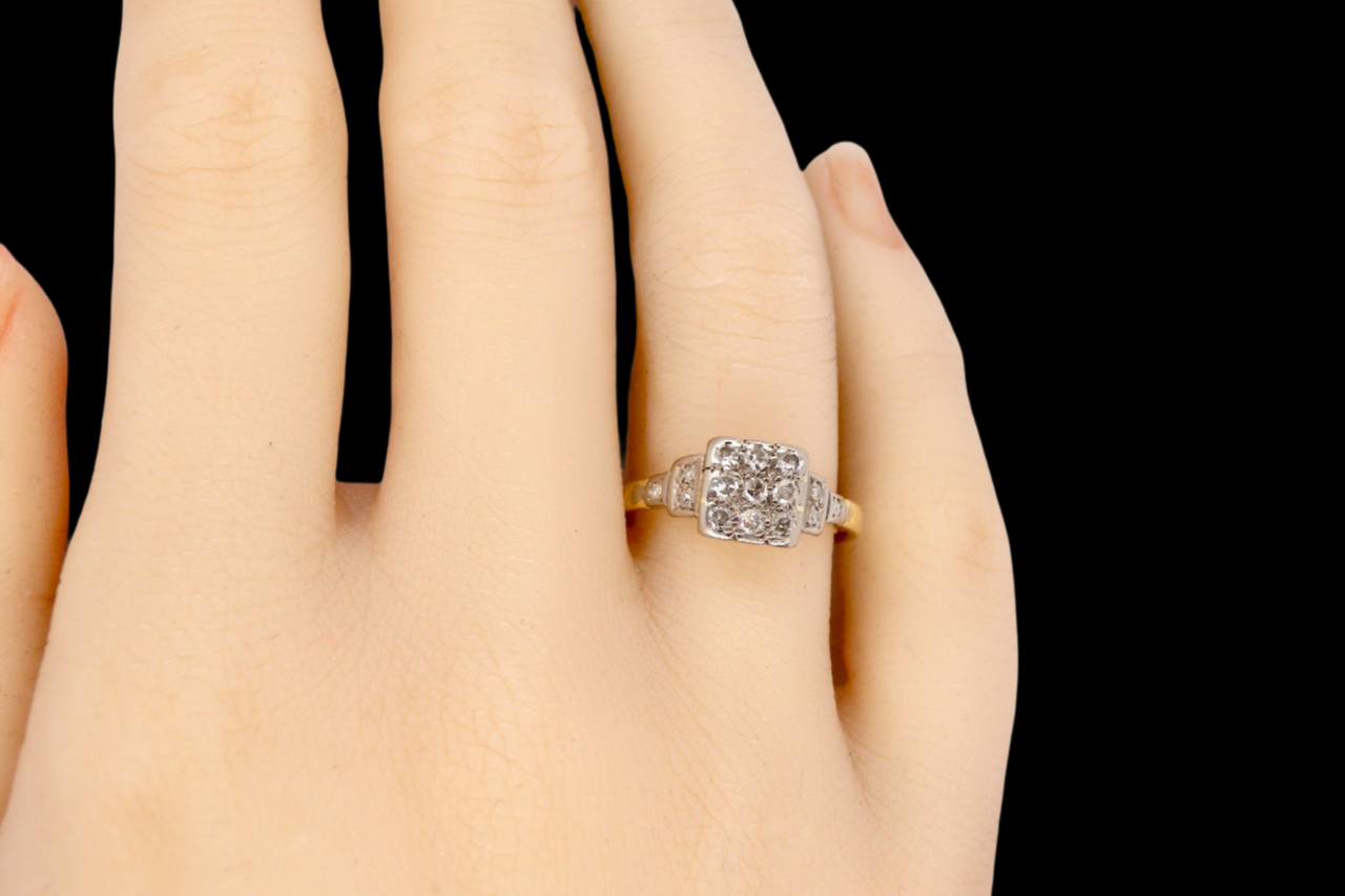 A diamond cluster ring