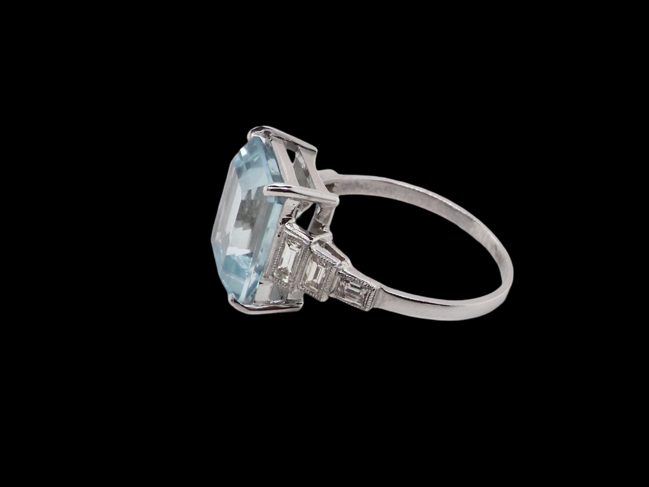 An Aquamarine and Diamond Ring