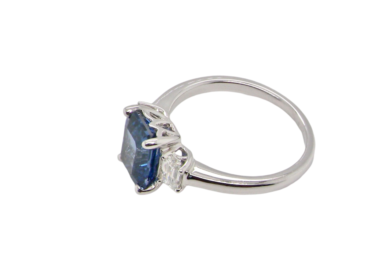 A fine three stone Sapphire and Diamond Ring side view