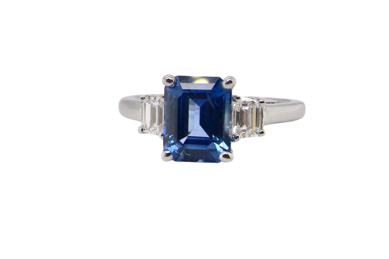 A three stone Sapphire and Diamond Ring