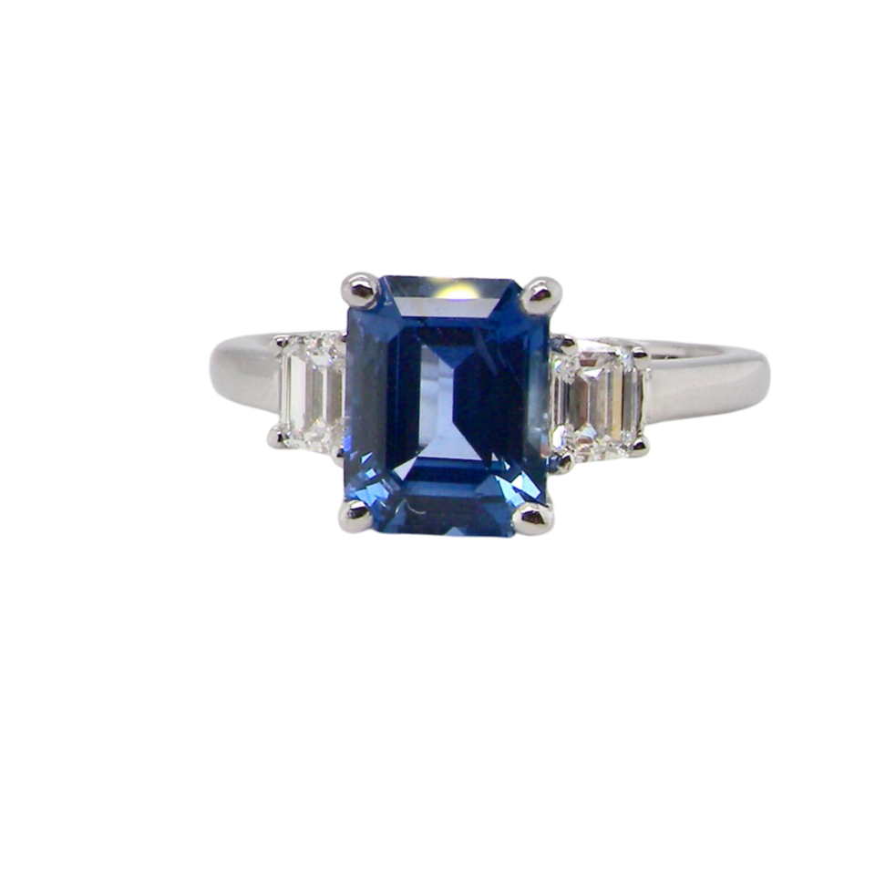 A three stone Sapphire and Diamond Ring