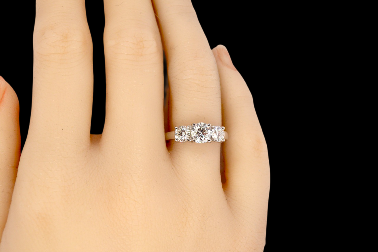 A fine and impressive trilogy Diamond Ring finger view