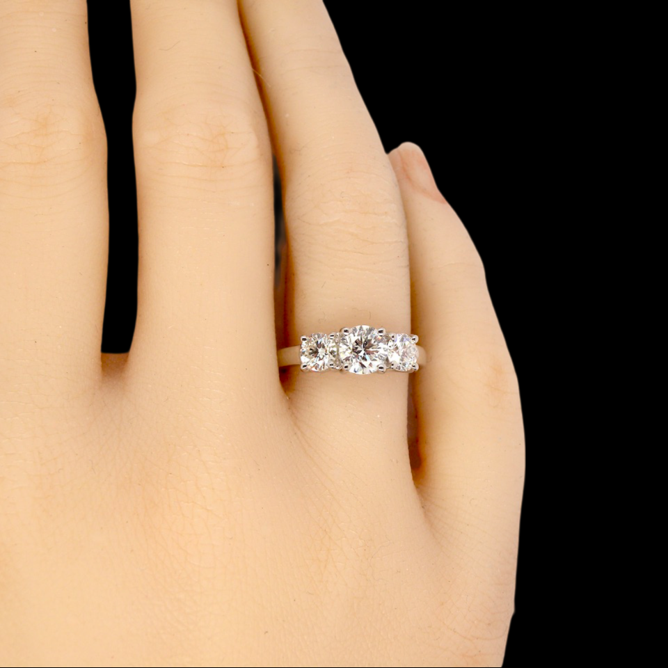 A fine and impressive trilogy Diamond Ring finger view