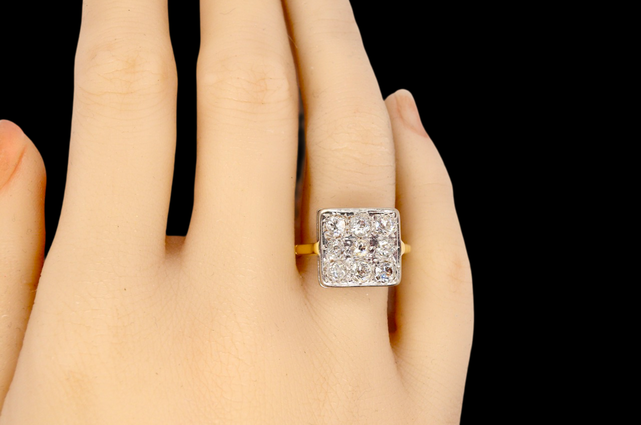 A plaque style Art Deco diamond ring finger view