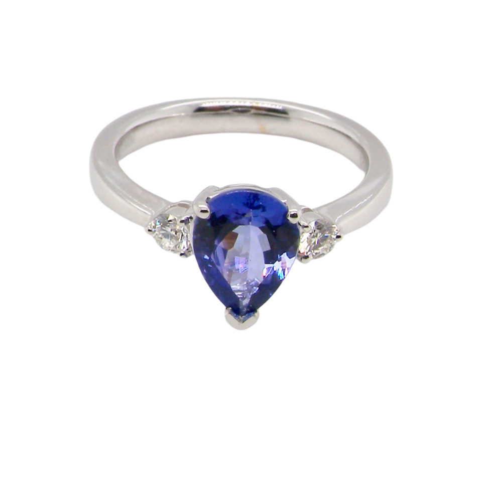 A Tanzanite and Diamond 3 stone Ring