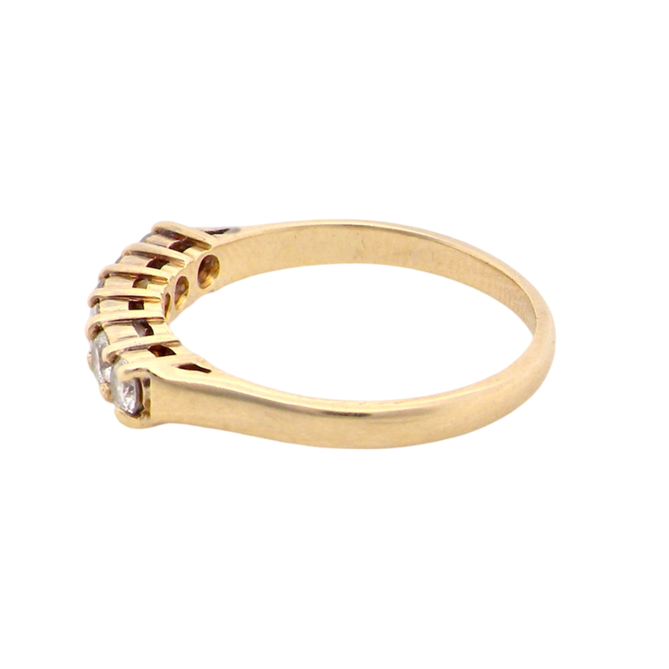 A half hoop diamond ring side view