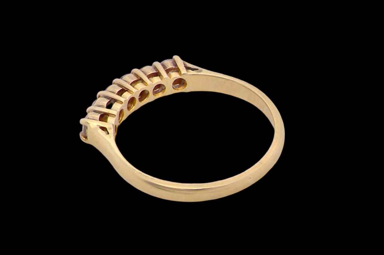 A half hoop diamond ring rear view