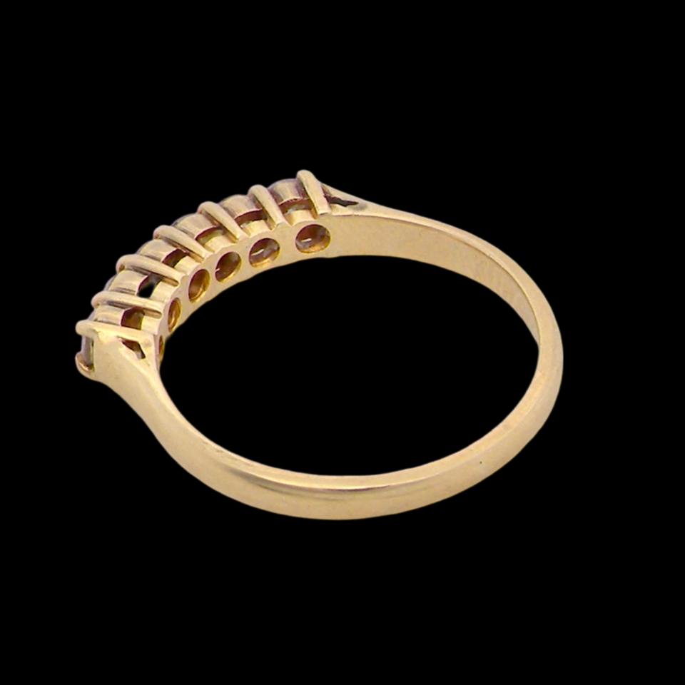 A half hoop diamond ring rear view