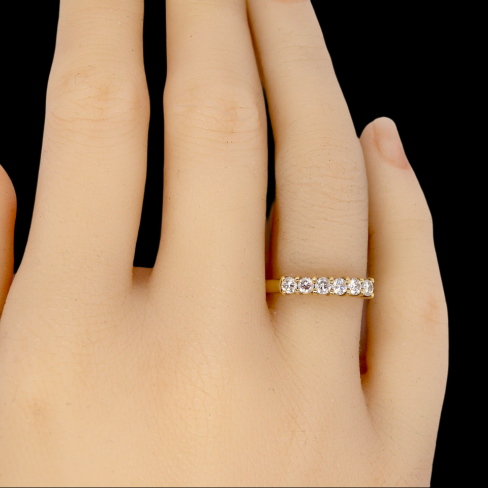 A half hoop diamond ring finger view