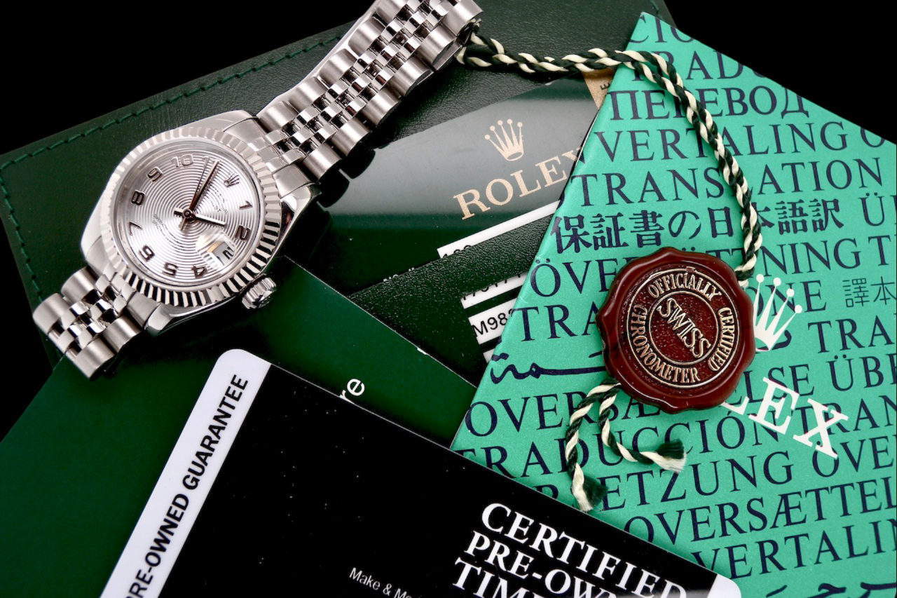 A womans steel Rolex wrist watch 179174 with papers