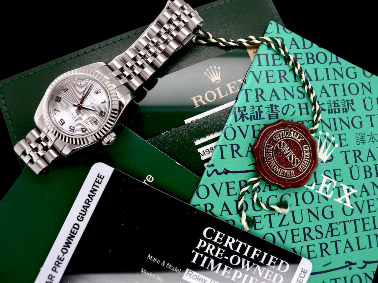 A womans steel Rolex wrist watch 179174 with papers