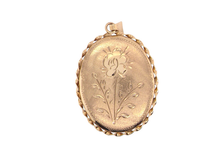 An oval 9 carat gold locket