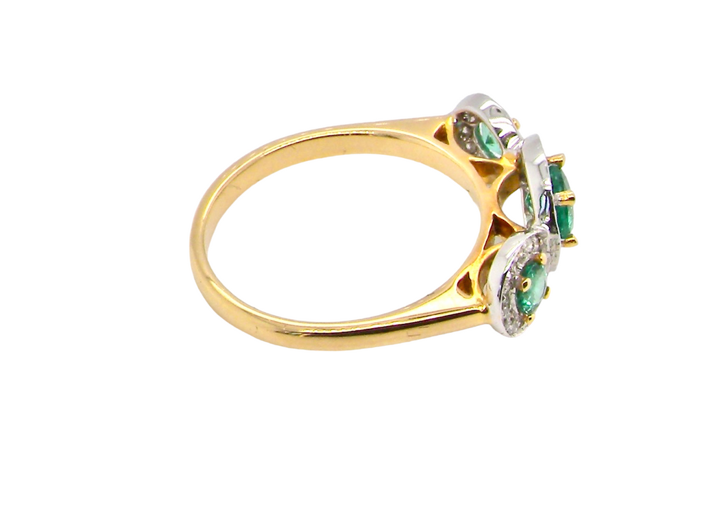 modern emerald and diamond multi cluster ring