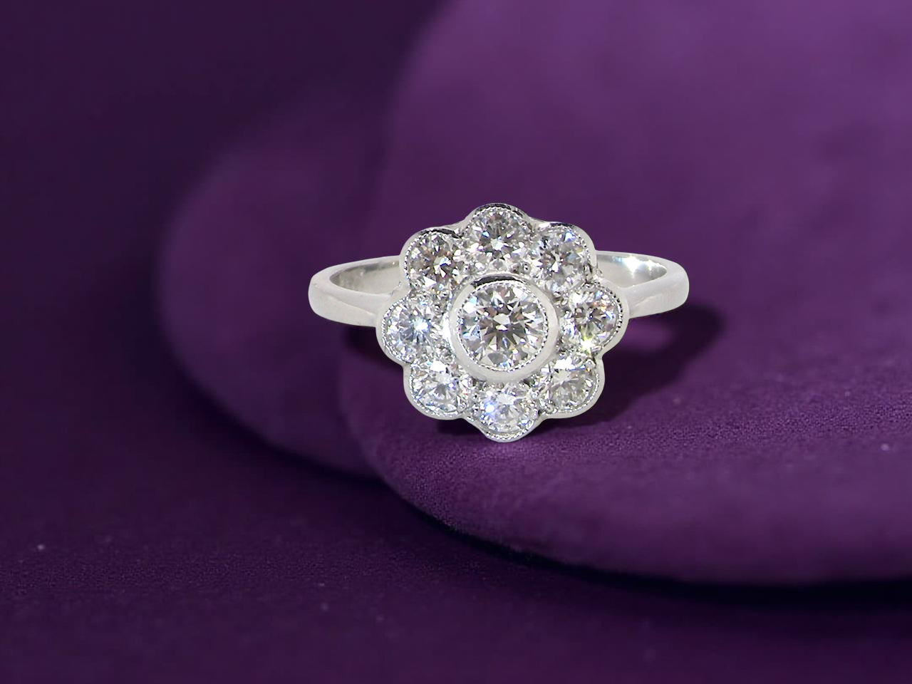 elegant vintage cluster ring crafted in platinum* and set with a diamond stone, 0.25ct