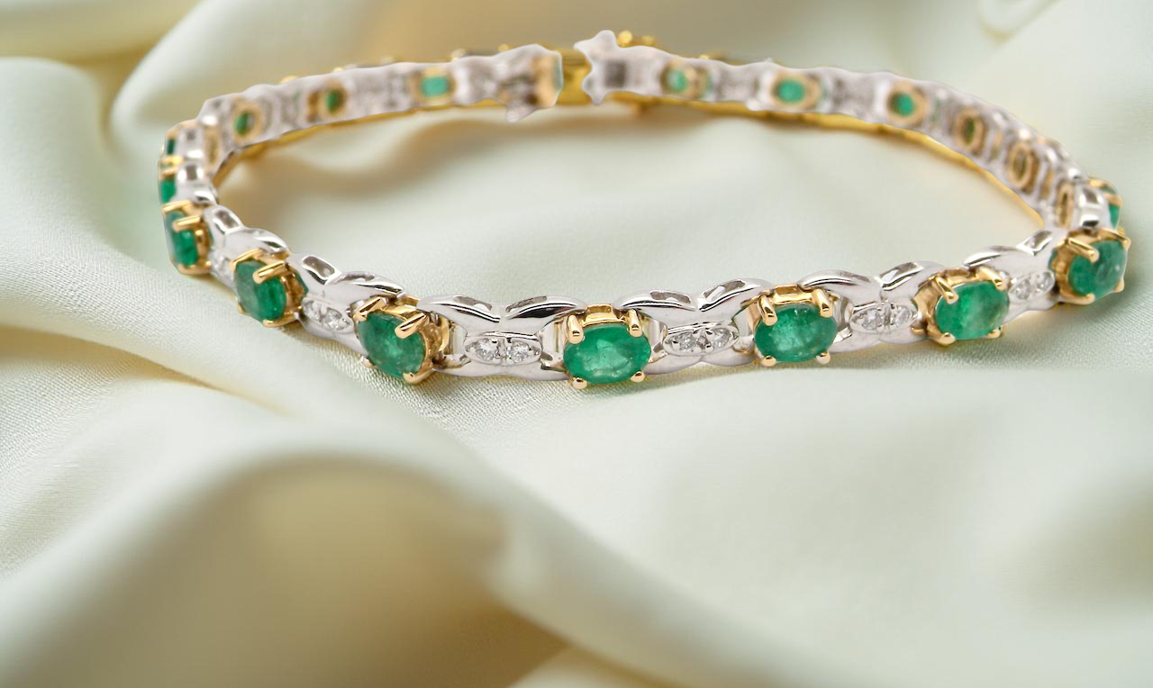 A white gold Emerald and Diamond bracelet
