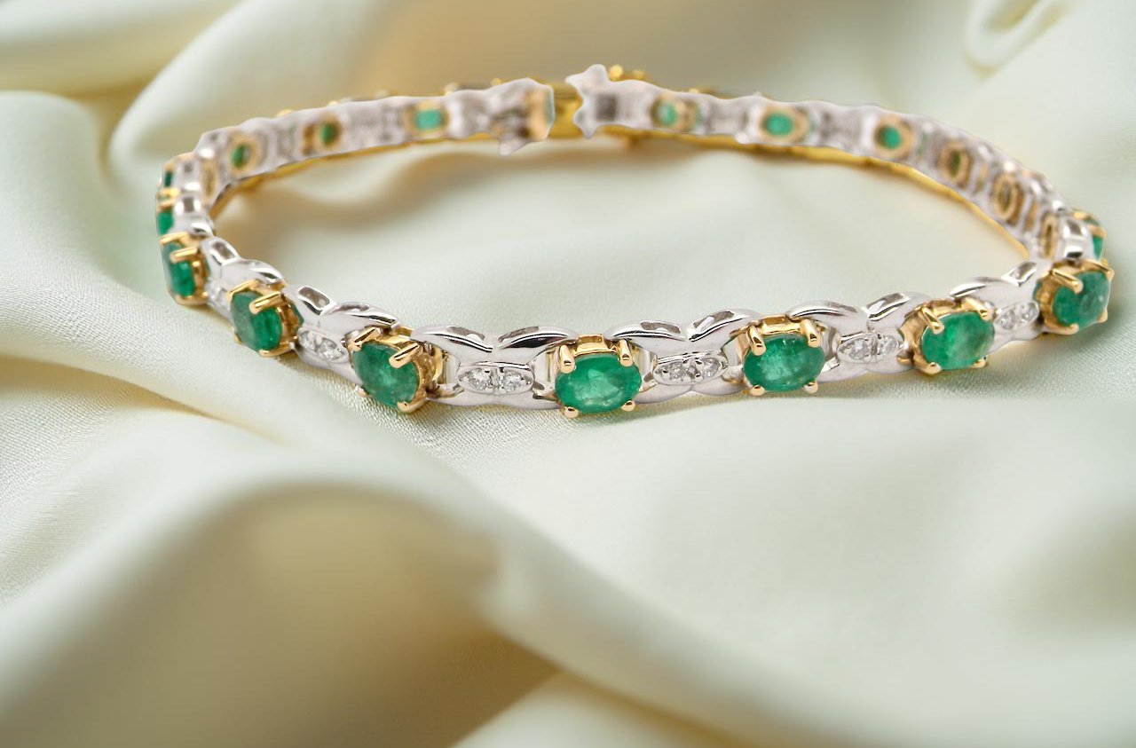 A white gold Emerald and Diamond bracelet