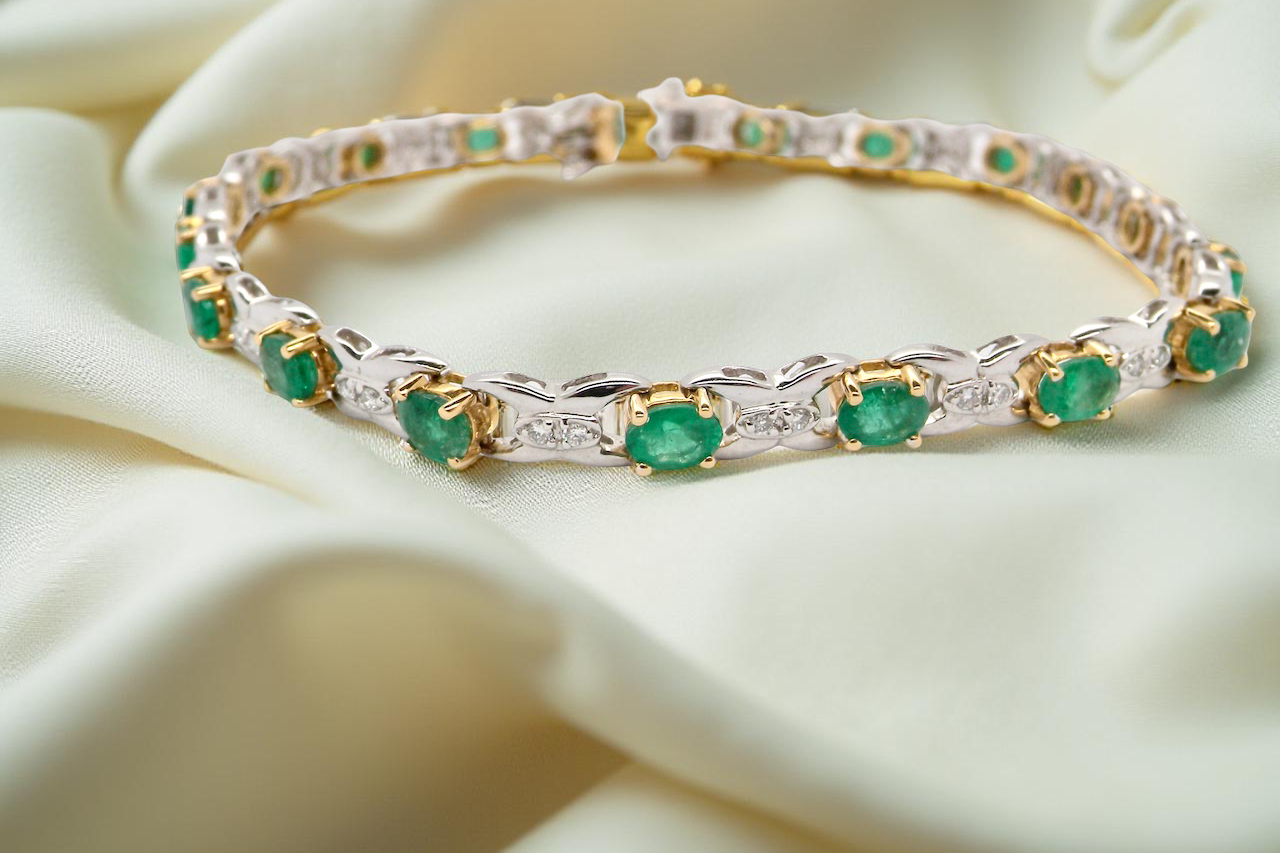 A white gold Emerald and Diamond bracelet